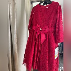 Just in time for the holidays! Beautiful, bright red dress.